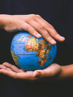 hand-holding-globe-for-earth-day-campaign-U3C3WAY-scaled.jpg